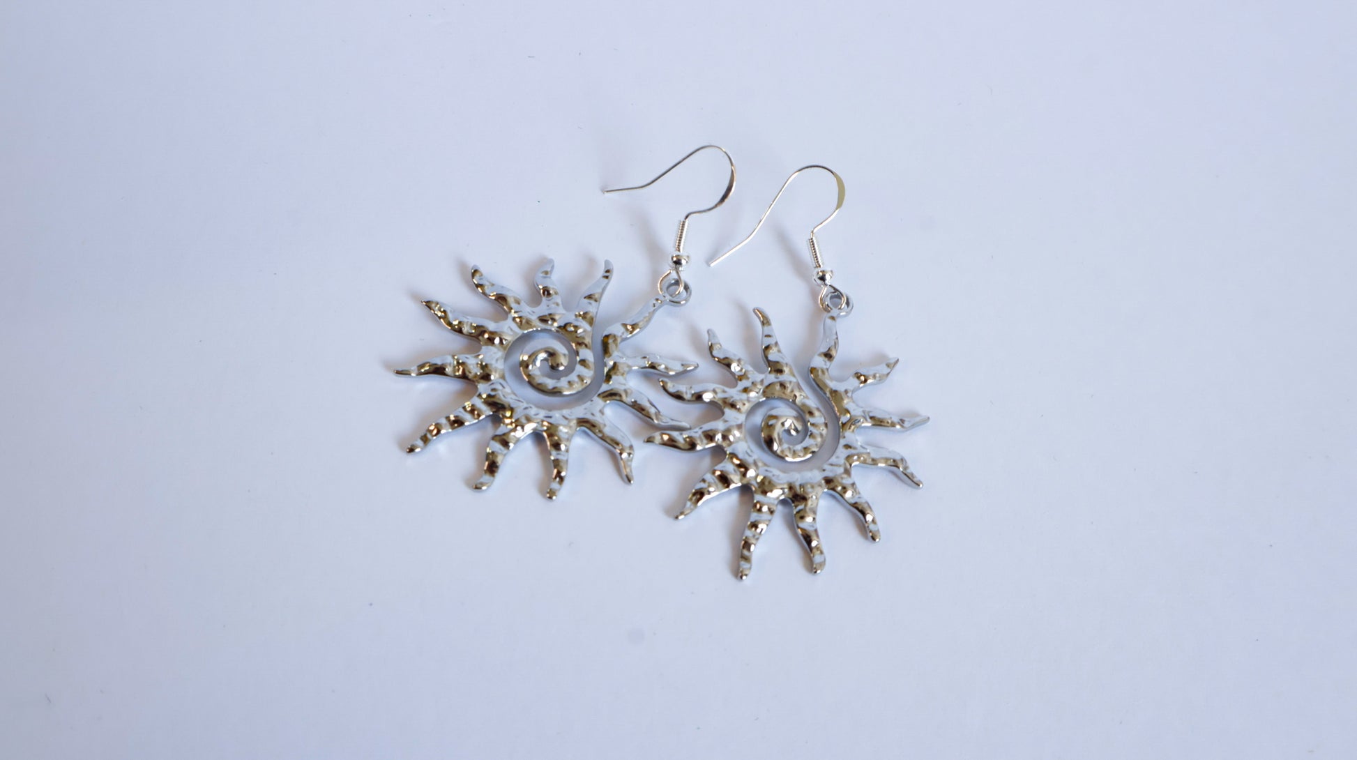 Boucles argent forme soleil été indien