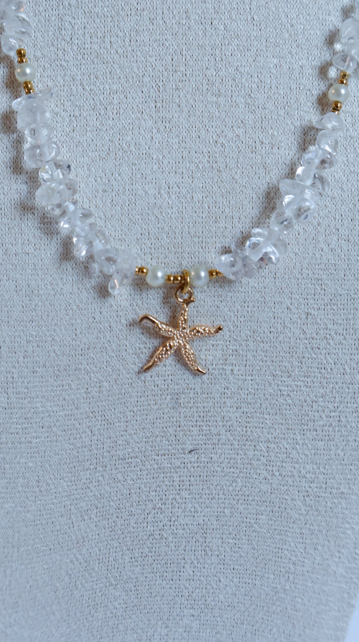 Pendentif étoile de mer et quartz cristal