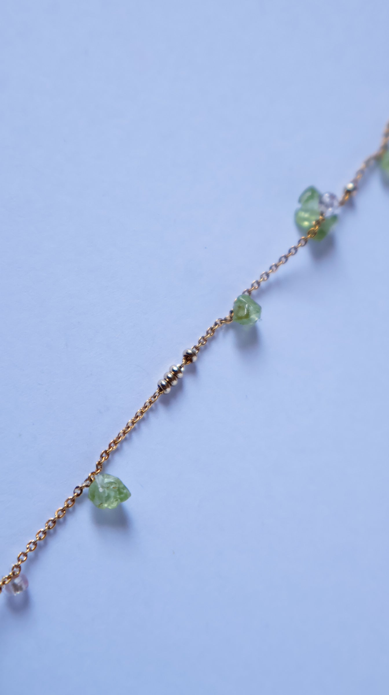 Perles dorées mouvantes sur chaîne en acier inoxydable 316L dorée